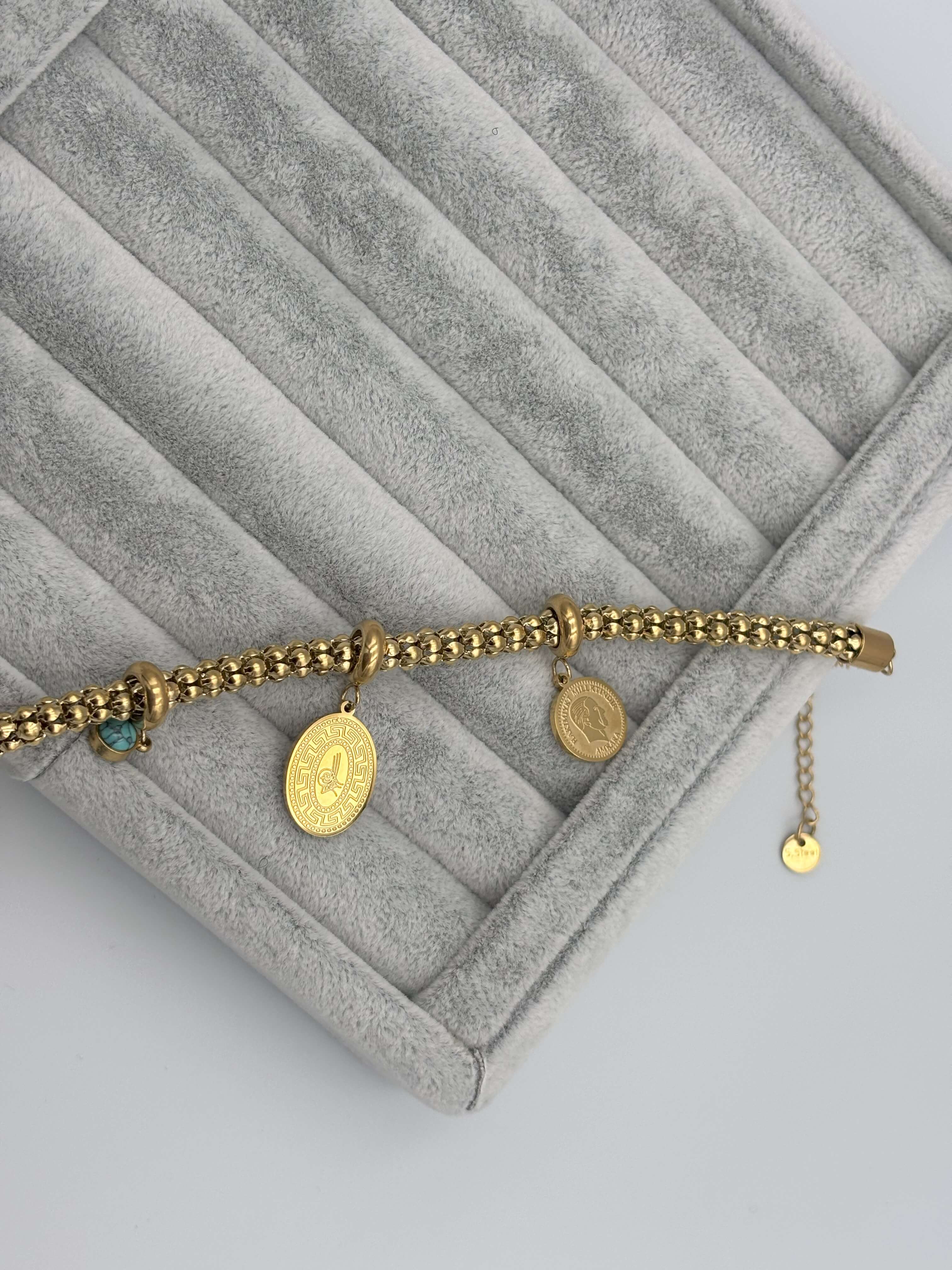 ÇELİK TUĞRALI ÖRGÜ MODEL BİLEKLİK (GOLD)