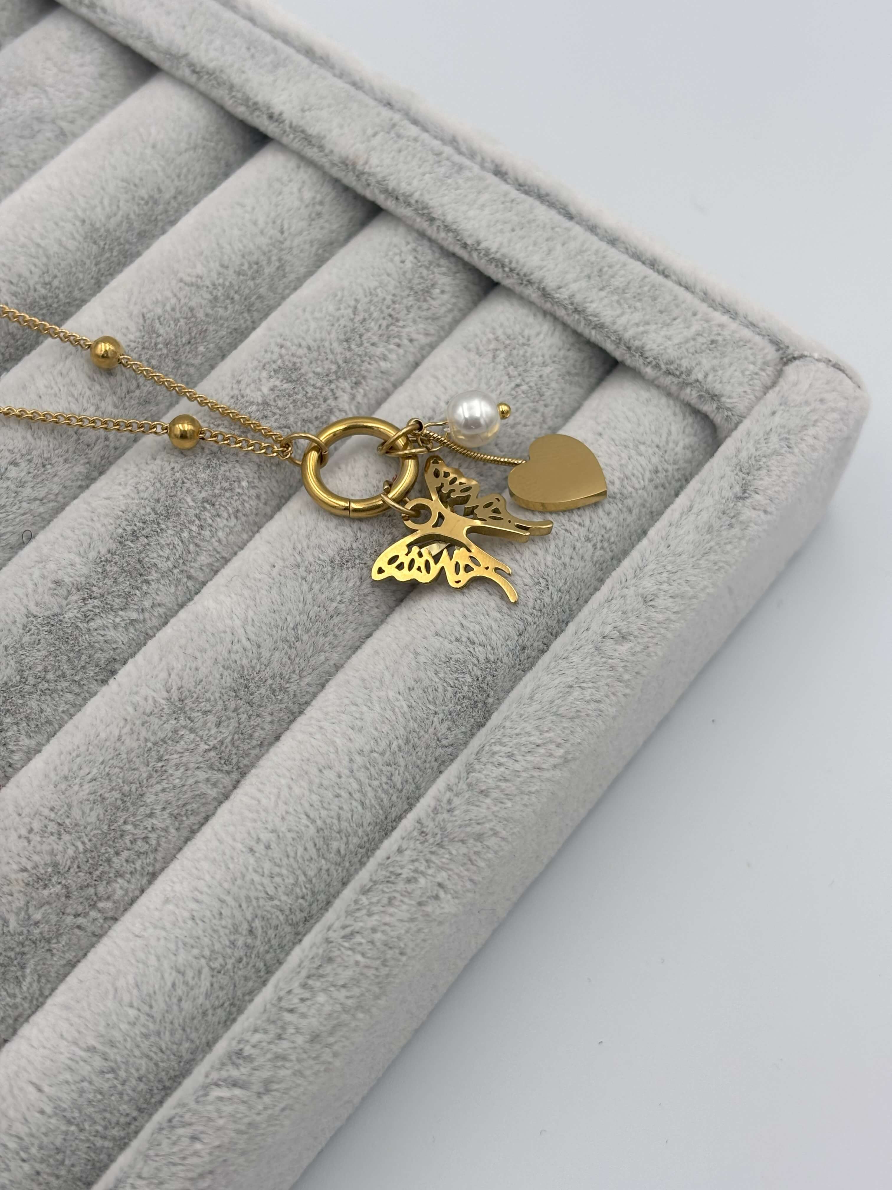 ÇELİK KELEBEK VE KALP FİGÜRLÜ GOLD KOLYE 